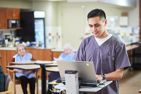 Nursing student working in a long term care home