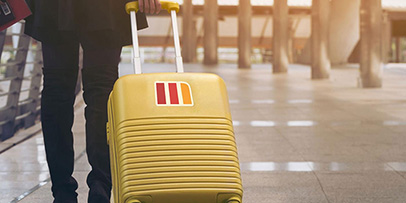 Carrying luggage in airport