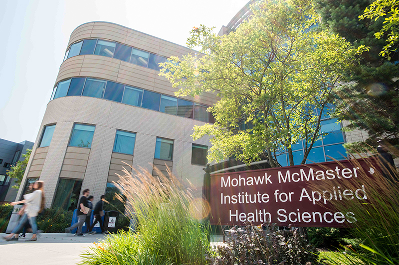 Students walking by the Institute for Applied Health Sciences entrance