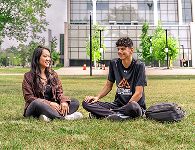 Students on Campus Lawn.