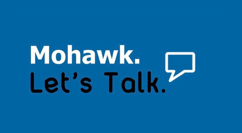 Blue background with white speech bubble. Text reads Mohawk Let's Talk.