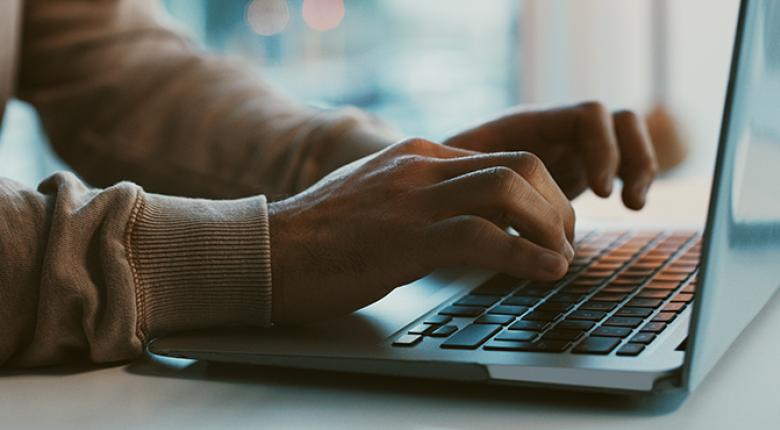 hands on a key board