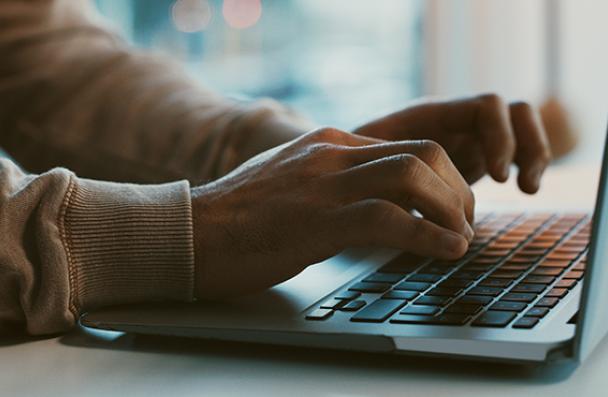 hands on a key board