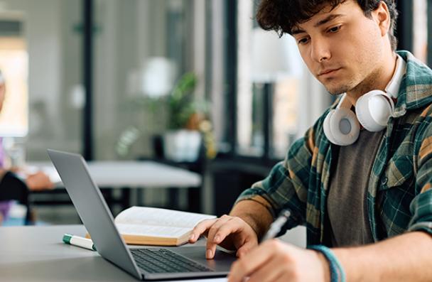 White male working on the computer