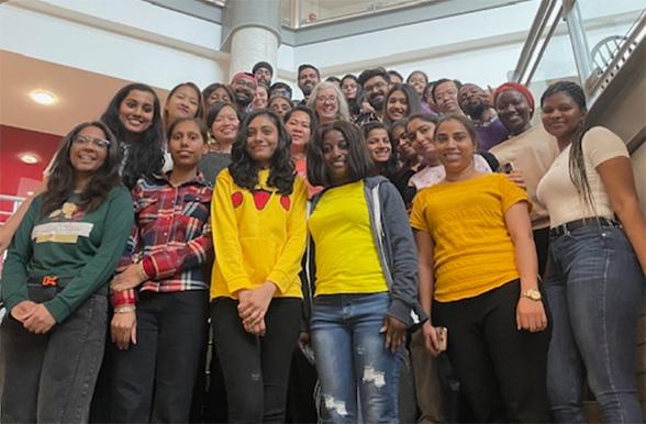 Students in the Canadian Health Care for Foreign Trained Professionals program posing in the Mohawk College atrium.